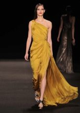 Yellow evening dress on one shoulder