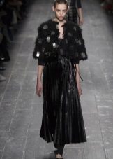 Fur cape to black leather dress