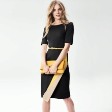 Asymmetrical dress in black and white.