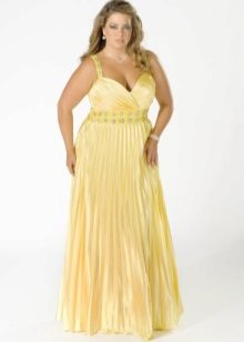 Elegant evening dress of the big size long yellow