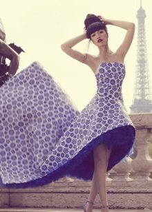 Blue and white evening dress with a train