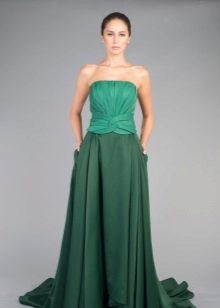 Evening dress with drapery on the corset