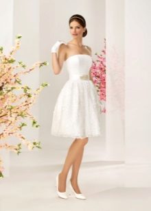 A wedding dress from the Kookla reflection collection is short and magnificent