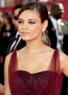 Makeup under a wine-colored dress