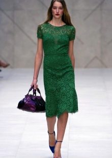 Green dress with blue bag