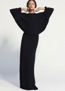 Long black bat dress with straight skirt