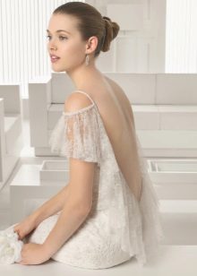 White dress with open back with fringe