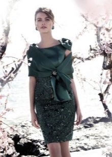 Cape to green dress