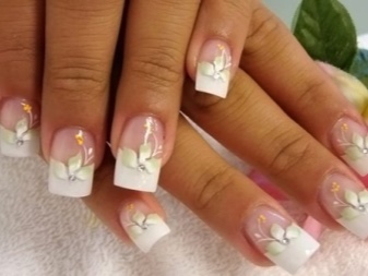 Manicure French with golden elements under a mustard dress