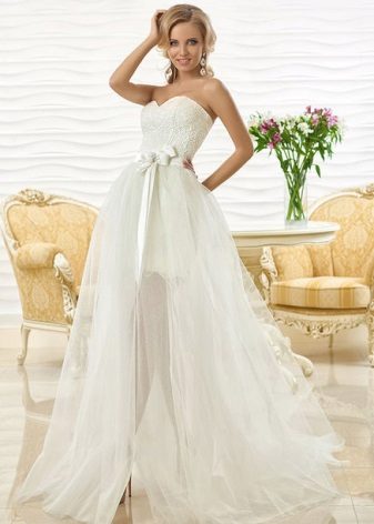 Short wedding dress with a removable train