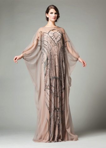 Dress evening with a bat sleeve