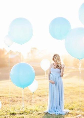 Pregnant in a dress with balls