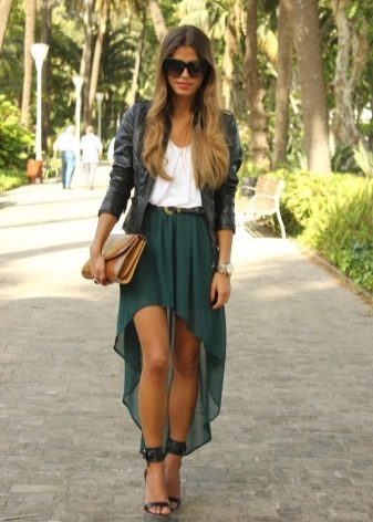 Asymmetrical skirt at heeled sandals