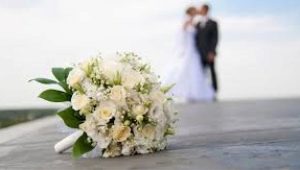 Who should buy a bridal bouquet?