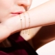 Women's gold chain on hand