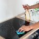 Paano upang linisin ang salamin ceramic kalan mula sa uling?