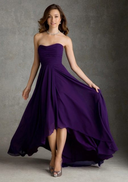 Shoes under a purple evening dress