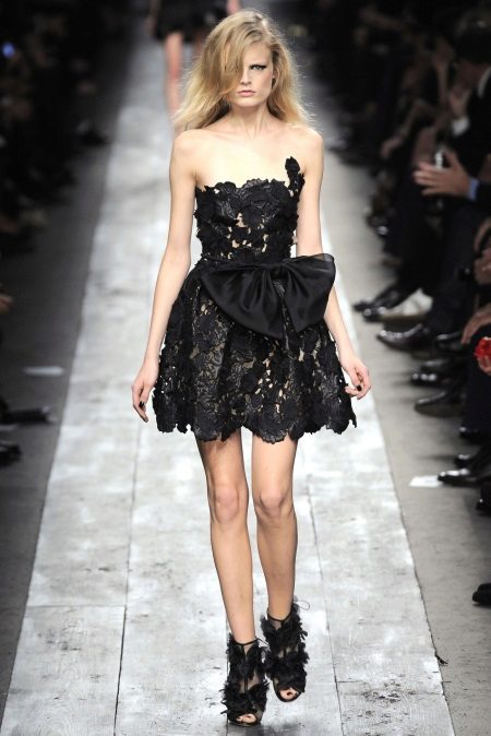 Lace evening dress with a fluffy skirt