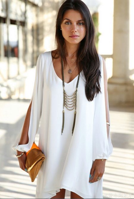 Short dress with long sleeves with a slit