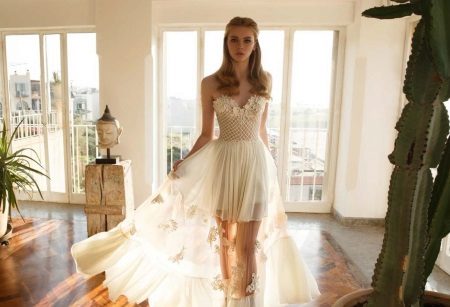 Strapless wedding dress with see-through skirt